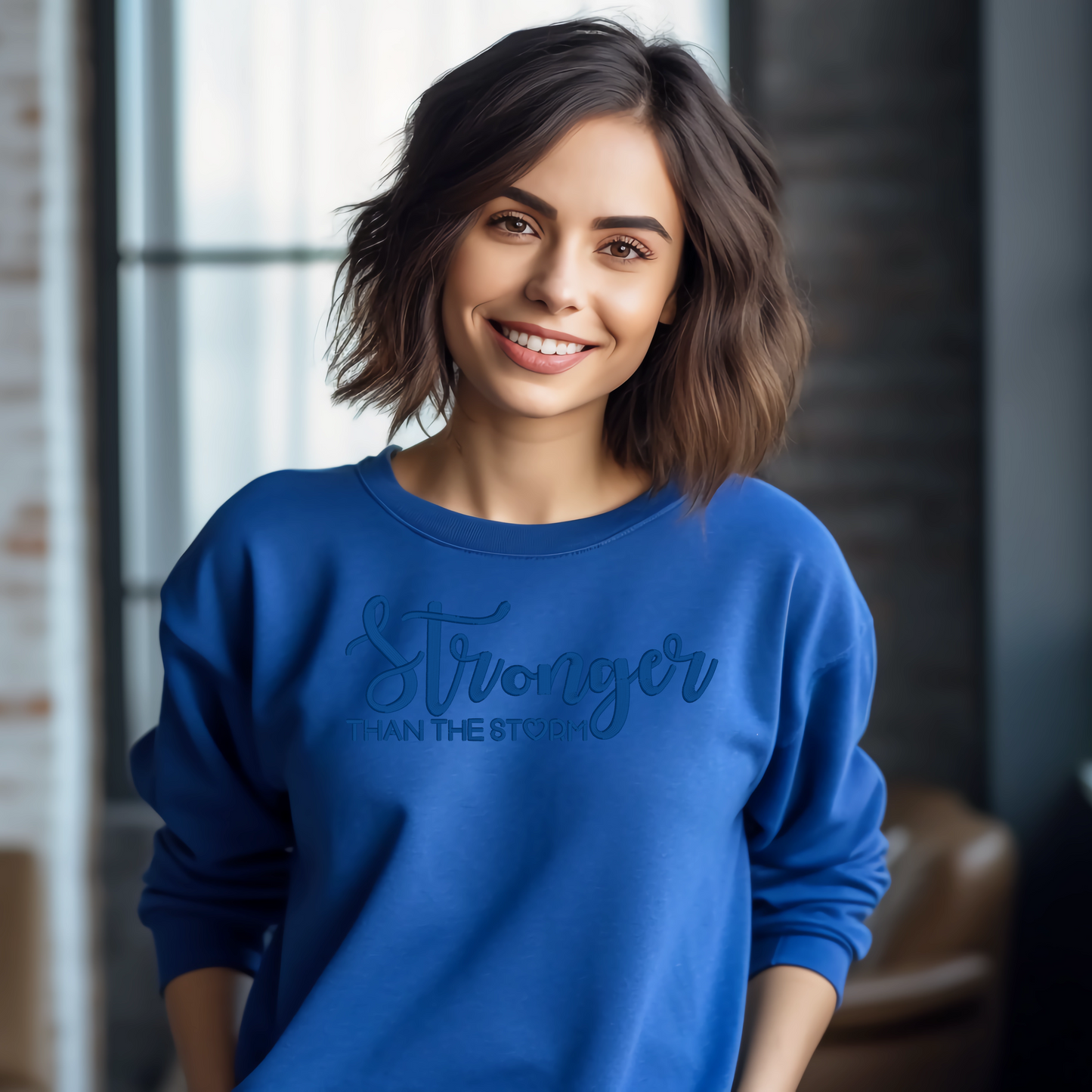 Stronger Than The Storm Embroidered Unisex Sweatshirt in Royal Blue